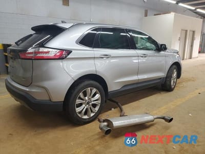 Trzecie zdjęcie samochodu z tyłu: 2023 FORD EDGE TITANIUM VIN:2FMPK4K98PBA46546 - miniatura