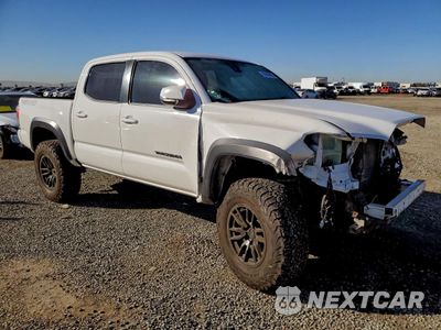 Czwarte zdjęcie samochodu z boku: 2021 TOYOTA TACOMA DOUBLE CAB VIN:3TMCZ5AN6MM402862 - miniatura