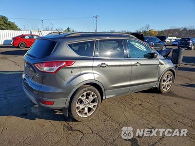 Trzecie zdjęcie samochodu z tyłu: 2016 FORD ESCAPE SE VIN:1FMCU9G92GUC16330 - miniatura