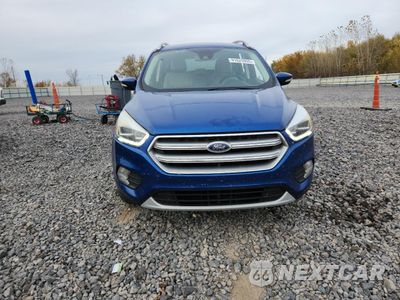 Piąte zdjęcie samochodu w środku: 2017 FORD ESCAPE TITANIUM VIN:1FMCU9JD0HUA12611 - miniatura