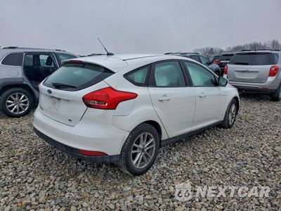 Trzecie zdjęcie samochodu z tyłu: 2017 FORD FOCUS SE VIN:1FADP3K22HL247601 - miniatura