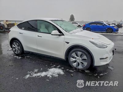 Czwarte zdjęcie samochodu z boku: 2021 TESLA MODEL Y VIN:5YJYGAEE8MF258881 - miniatura