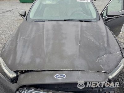 Zdjęcie 11 z 11 samochodu: 2016 FORD FUSION TITANIUM VIN:3FA6P0K95GR180321 - miniatura