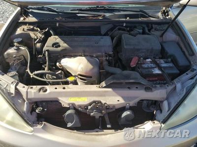 Zdjęcie 11 z 11 samochodu: 2002 TOYOTA CAMRY LE VIN:4T1BE32K02U555788 - miniatura