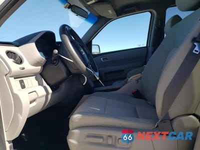 Zdjęcie 7 z 11 samochodu: 2011 HONDA PILOT EX VIN:5FNYF3H4XBB033683 - miniatura