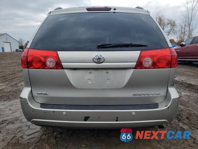 Zdjęcie 6 z 13 samochodu: 2010 TOYOTA SIENNA XLE VIN:5TDYK4CC3AS316002 - miniatura