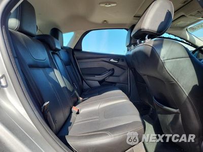 Zdjęcie 10 z 11 samochodu: 2014 FORD FOCUS TITANIUM VIN:1FADP3N2XEL280059 - miniatura