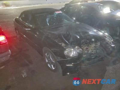 Czwarte zdjęcie samochodu z boku: 2005 MERCEDES-BENZ CLK 500 VIN:WDBTK75G25T050280 - miniatura
