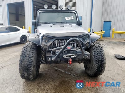 Piąte zdjęcie samochodu w środku: 2015 JEEP WRANGLER RUBICON VIN:1C4BJWCG4FL625977 - miniatura