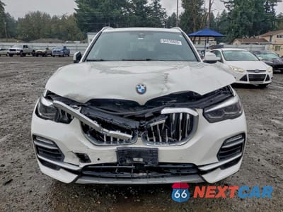 Piąte zdjęcie samochodu w środku: 2021 BMW X5 XDRIVE40I VIN:5UXCR6C06M9H26790 - miniatura