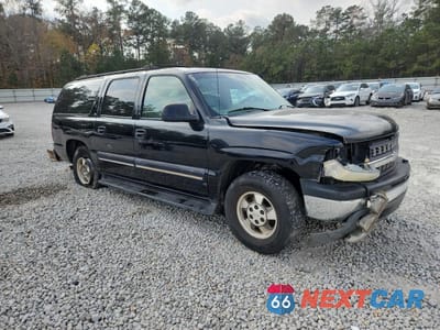 Czwarte zdjęcie samochodu z boku: 2001 CHEVROLET SUBURBAN C1500 VIN:3GNEC16T71G178951 - miniatura