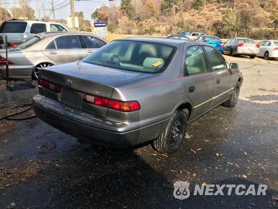 Czwarte zdjęcie samochodu z boku: 1999 TOYOTA CAMRY CE VIN:4T1BG22K8XU567179 - miniatura