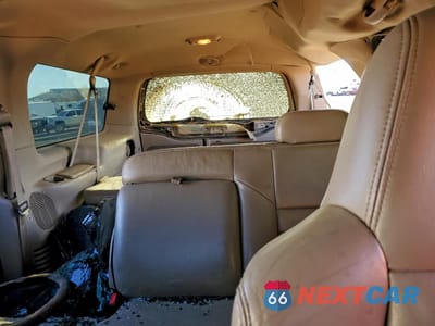 Zdjęcie 10 z 15 samochodu: 2004 FORD EXCURSION LIMITED VIN:1FMSU43P14EB83510 - miniatura
