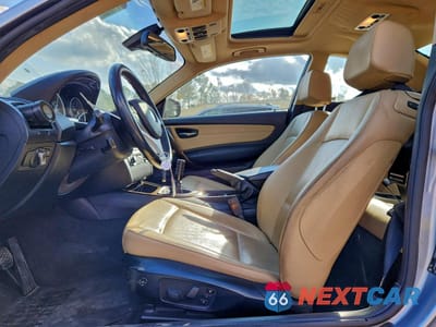 Zdjęcie 7 z 14 samochodu: 2012 BMW 128 I VIN:WBAUP9C58CVF46528 - miniatura