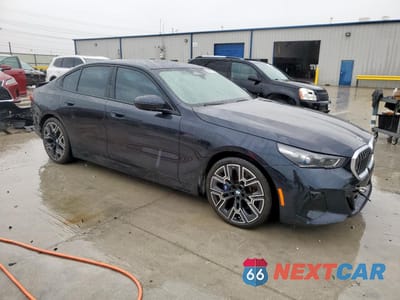 Czwarte zdjęcie samochodu z boku: 2024 BMW 530 I VIN:WBA43FJ03RCR20255 - miniatura