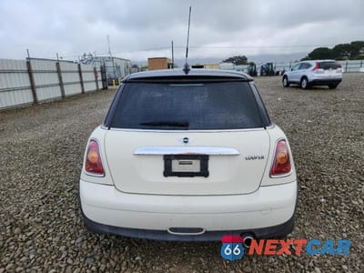 Zdjęcie 6 z 11 samochodu: 2010 MINI COOPER VIN:WMWMF3C52ATU77440 - miniatura