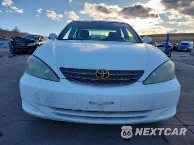Piąte zdjęcie samochodu w środku: 2004 TOYOTA CAMRY LE VIN:4T1BF32K44U073065 - miniatura