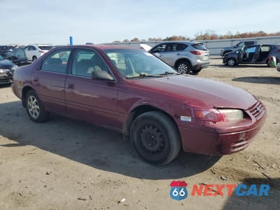 Czwarte zdjęcie samochodu z boku: 1997 TOYOTA CAMRY CE VIN:4T1BF22K5VU006390 - miniatura