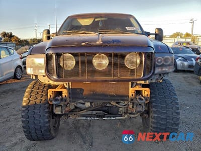 Piąte zdjęcie samochodu w środku: 1999 FORD F350 SRW SUPER DUTY VIN:1FTSW31S8XEF03054 - miniatura