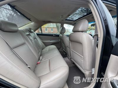Zdjęcie 6 z 13 samochodu: 2002 TOYOTA CAMRY LE VIN:4T1BF30K42U013318 - miniatura