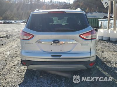 Zdjęcie 6 z 14 samochodu: 2014 FORD ESCAPE TITANIUM VIN:1FMCU0J95EUE23991 - miniatura