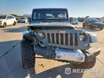 Piąte zdjęcie samochodu w środku: 2015 JEEP WRANGLER UNLIMITED SAHARA VIN:1C4BJWEG6FL622320 - miniatura