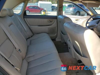 Zdjęcie 10 z 13 samochodu: 2000 TOYOTA AVALON VIN:4T1BF28B0YU074110 - miniatura