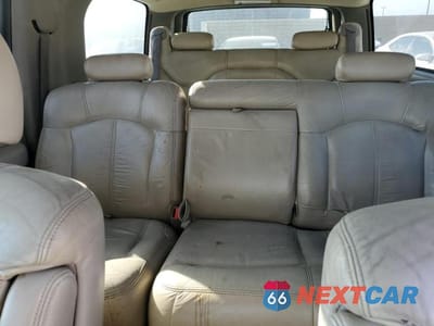 Zdjęcie 10 z 13 samochodu: 2002 CHEVROLET SUBURBAN C1500 VIN:1GNEC16T42J216099 - miniatura