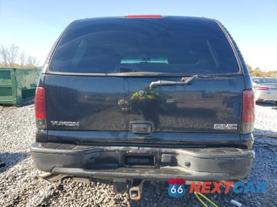 Zdjęcie 6 z 13 samochodu: 2003 GMC YUKON VIN:1GKEC13Z53R184983 - miniatura