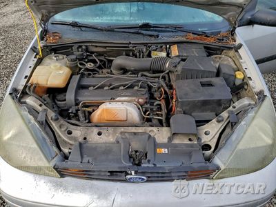 Zdjęcie 12 z 13 samochodu: 2004 FORD FOCUS ZX3 VIN:3FAFP31314R115279 - miniatura