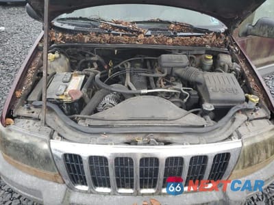 Zdjęcie 12 z 13 samochodu: 1999 JEEP GRAND CHEROKEE LAREDO VIN:1J4GW58SXXC566847 - miniatura