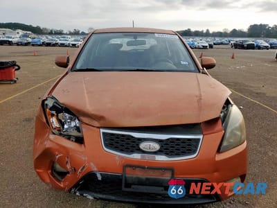 Piąte zdjęcie samochodu w środku: 2010 KIA RIO LX VIN:KNADH5A33A6659055 - miniatura