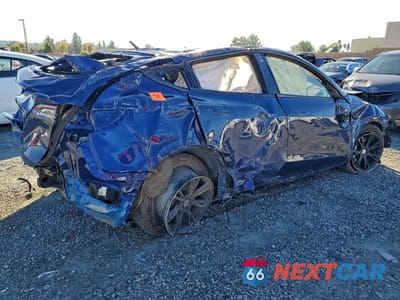 Trzecie zdjęcie samochodu z tyłu: 2022 TESLA MODEL Y VIN:7SAYGAEE5NF467290 - miniatura