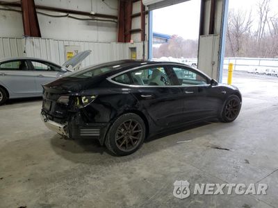 Trzecie zdjęcie samochodu z tyłu: 2019 TESLA MODEL 3 VIN:5YJ3E1EB9KF194983 - miniatura