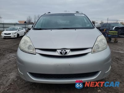 Piąte zdjęcie samochodu w środku: 2010 TOYOTA SIENNA XLE VIN:5TDYK4CC3AS316002 - miniatura