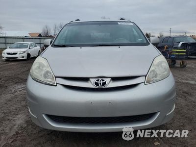 Piąte zdjęcie samochodu w środku: 2010 TOYOTA SIENNA XLE VIN:5TDYK4CC3AS316002 - miniatura