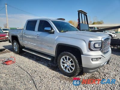 Czwarte zdjęcie samochodu z boku: 2018 GMC SIERRA K1500 DENALI VIN:3GTU2PECXJG409594 - miniatura