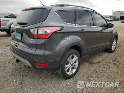 Trzecie zdjęcie samochodu z tyłu: 2017 FORD ESCAPE SE VIN:1FMCU9G98HUF00918 - miniatura