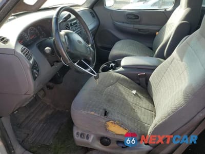 Zdjęcie 7 z 11 samochodu: 2000 FORD F-150 VIN:1FTRX18L2YKA96009 - miniatura