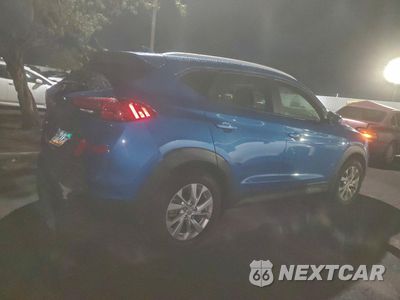 Trzecie zdjęcie samochodu z tyłu: 2021 HYUNDAI TUCSON LIMITED VIN:KM8J33A45MU297646 - miniatura
