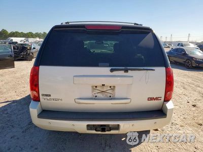 Zdjęcie 6 z 13 samochodu: 2011 GMC YUKON VIN:1GKS1CE01BR186585 - miniatura