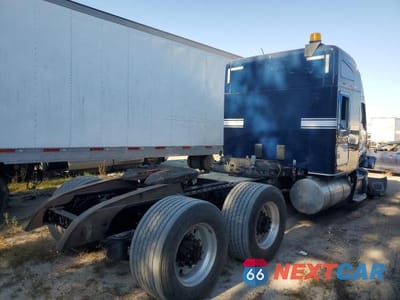 Czwarte zdjęcie samochodu z boku: 2020 KENWORTH T680 SEMI TRUCK VIN:1XKYDP9X3LJ373262 - miniatura