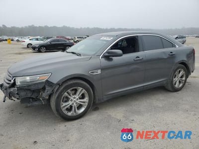 2015 FORD TAURUS SEL 1FAHP2E89FG147934 - główne zdjęcie licytacji z USA - miniatura