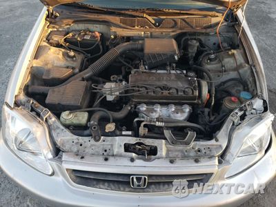 Zdjęcie 11 z 14 samochodu: 2000 HONDA CIVIC BASE VIN:2HGEJ6615YH514828 - miniatura