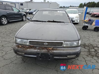 Piąte zdjęcie samochodu w środku: 1992 NISSAN MAXIMA GXE VIN:JN1HJ01F1NT015246 - miniatura