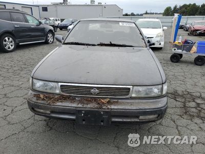 Piąte zdjęcie samochodu w środku: 1992 NISSAN MAXIMA GXE VIN:JN1HJ01F1NT015246 - miniatura