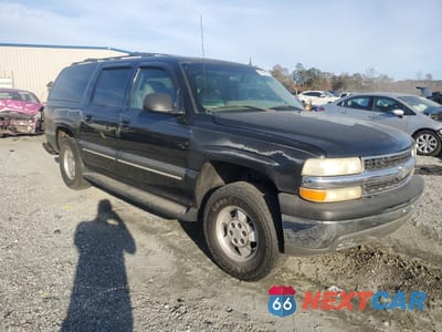 Czwarte zdjęcie samochodu z boku: 2002 CHEVROLET SUBURBAN C1500 VIN:1GNEC16Z42J229844 - miniatura