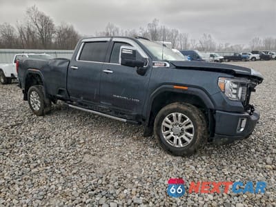 Czwarte zdjęcie samochodu z boku: 2022 GMC SIERRA K3500 DENALI VIN:1GT49WEY6NF118230 - miniatura