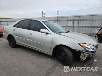Czwarte zdjęcie samochodu z boku: 2003 TOYOTA CAMRY LE VIN:JTDBE32K130150200 - miniatura