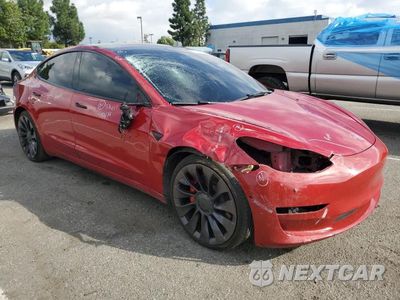 Czwarte zdjęcie samochodu z boku: 2021 TESLA MODEL 3 VIN:5YJ3E1ECXMF097321 - miniatura